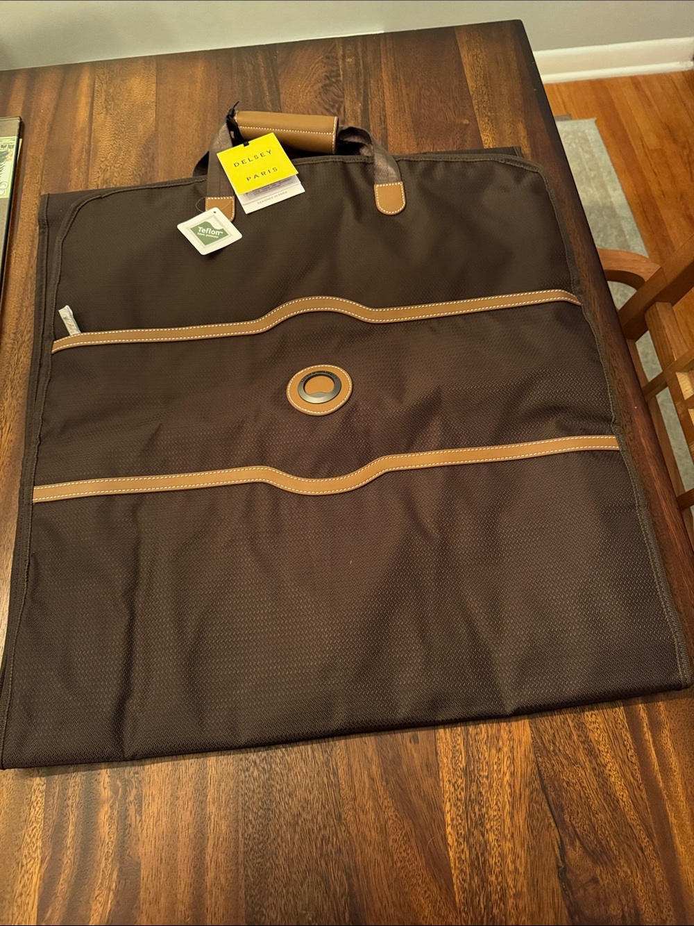 Delsey Paris Men's Brown/Tan Garment Travel Bag. Length is 74” (23.5 x 22 x 3)